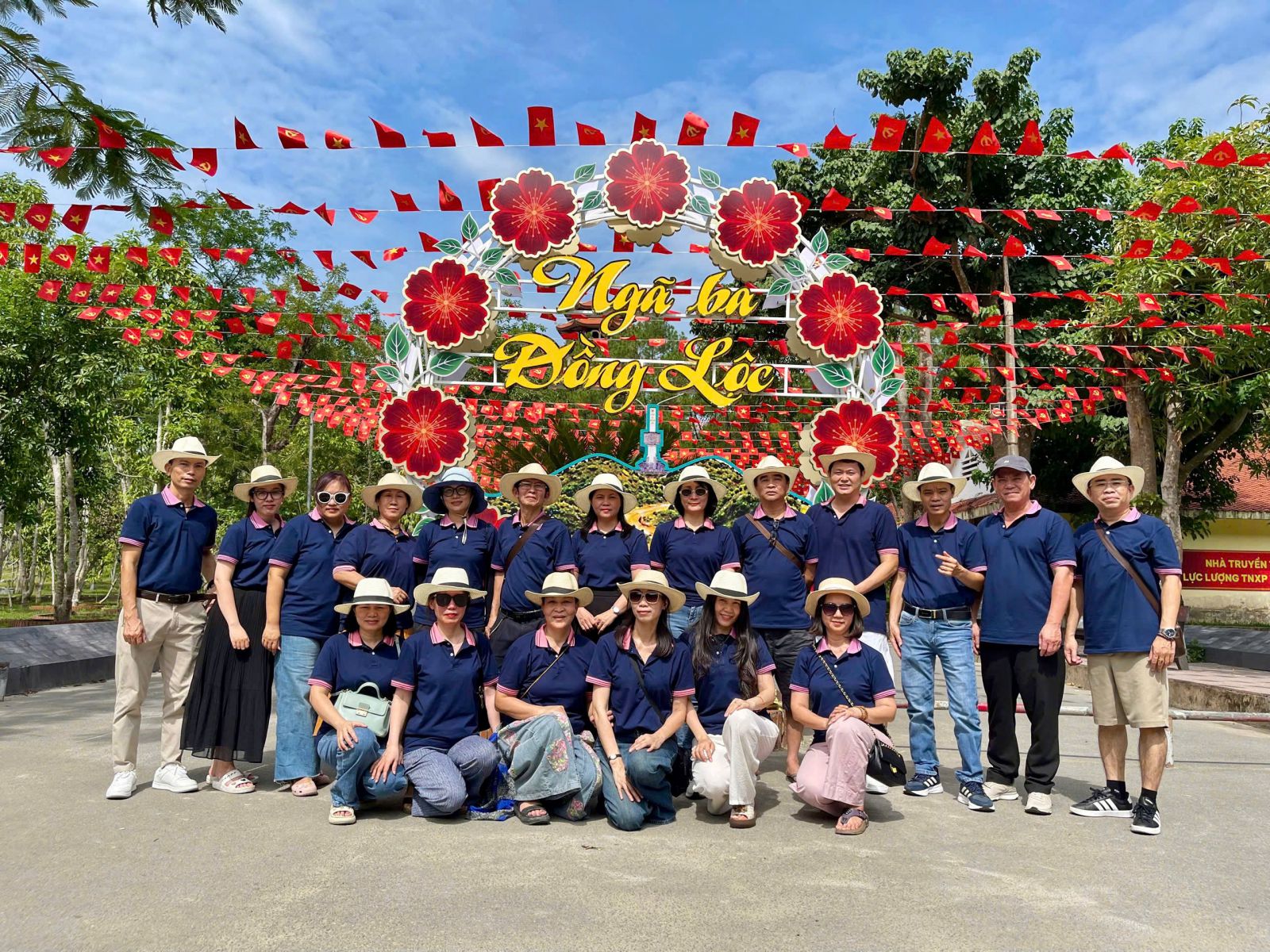 A group of people posing for a photoDescription automatically generated
